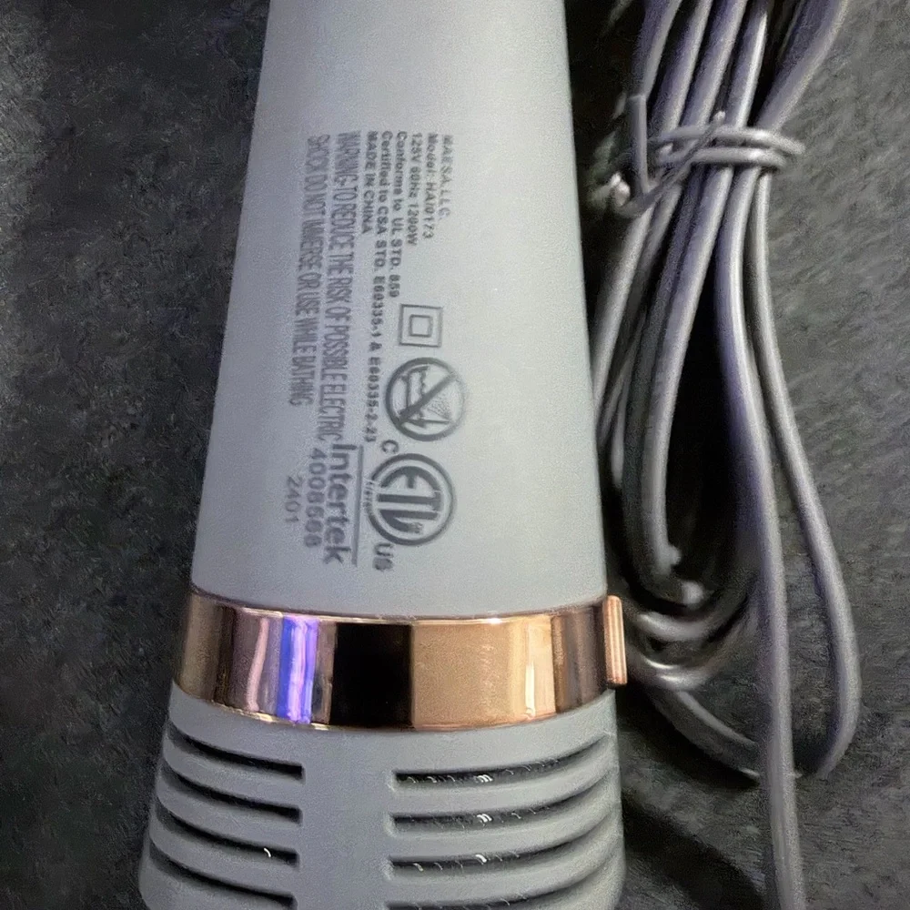 Sleek Pink and Gray Hair Dryer Brush